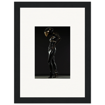 Shiny black latex or rubber bodysuit with a reflective helmet worn by a figure in a dramatic pose.