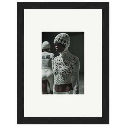 Black and white photograph of a person wearing an intricate, patterned bodysuit and helmet.