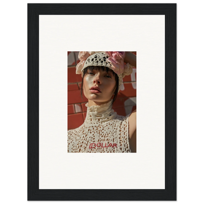 Framed portrait photograph of a person wearing a white crocheted hat and top.