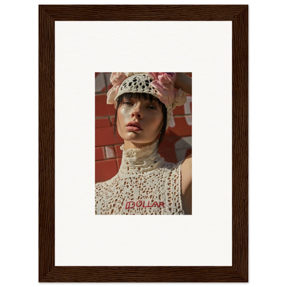 Framed portrait photograph of a person wearing a white crocheted hat and high-necked top.