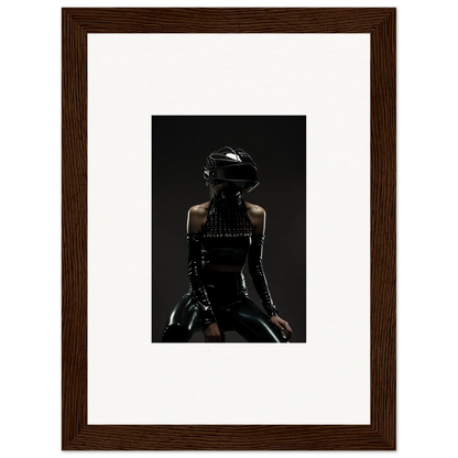 Silhouette of a person wearing a motorcycle helmet and leather outfit against a dark background.