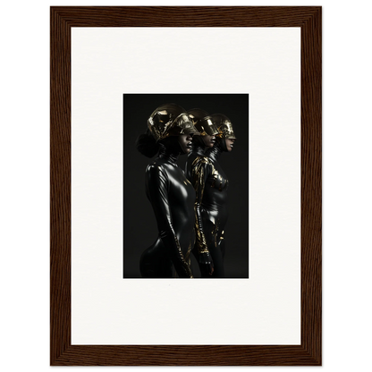 Framed black and white photograph of metallic-looking human figures in dramatic poses.