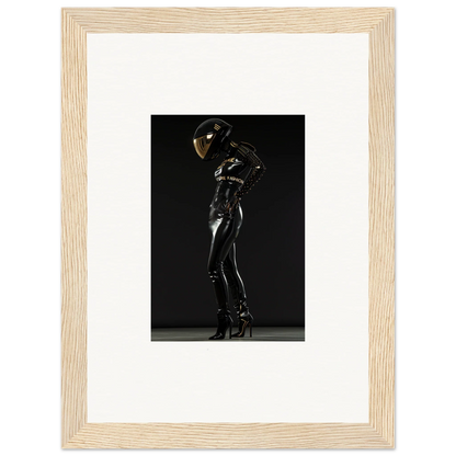 Shiny black latex-clad figure posing dramatically against a dark background.