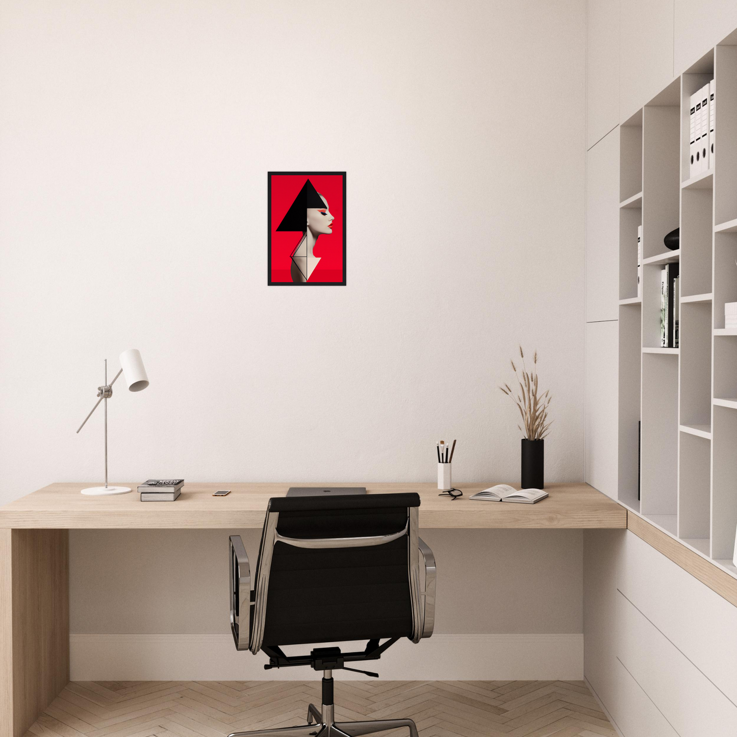 Minimalist home office workspace with a wooden desk, office chair, and striking red artwork on the wall.