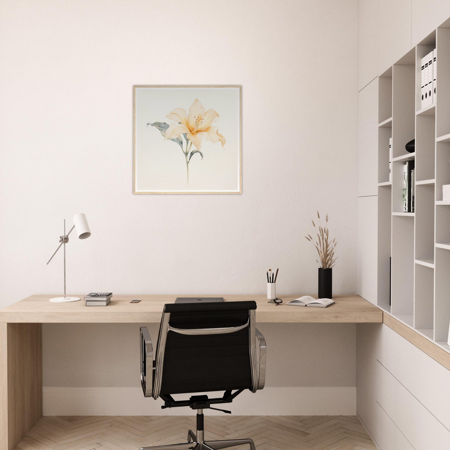 Minimalist home office workspace with a wooden desk, black office chair, and white shelving unit.