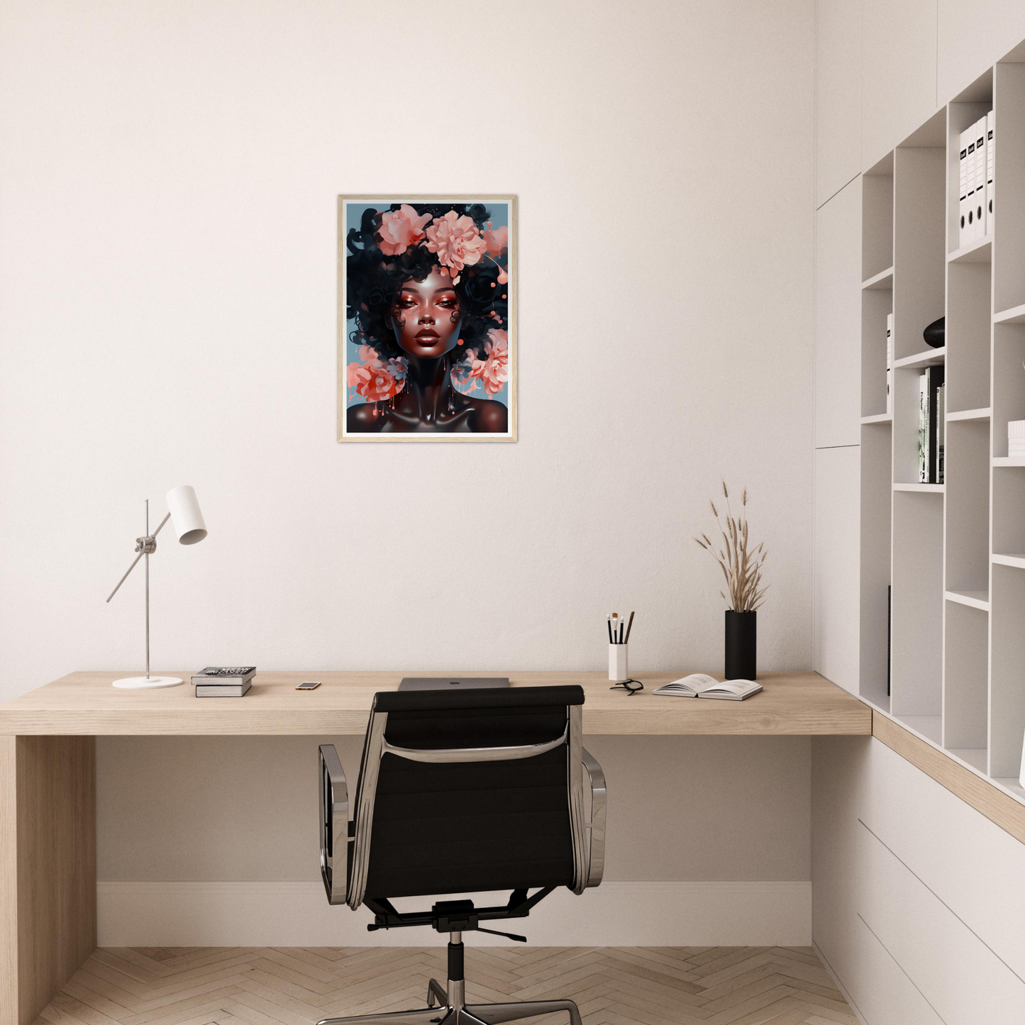 Minimalist home office workspace with a wooden desk, office chair, and colorful portrait artwork on the wall.