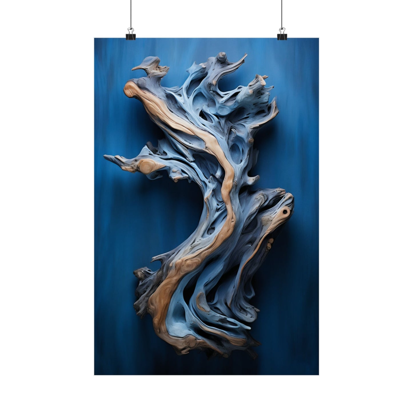 Swirling, abstract wooden sculpture with blue and tan tones resembling fluid motion.