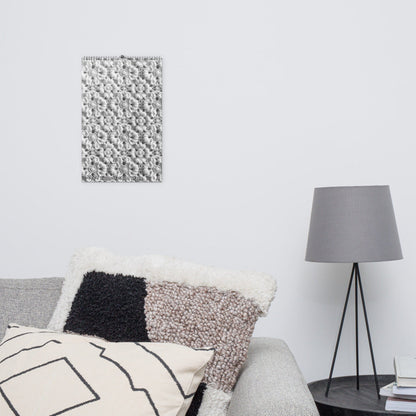 A cozy living room with a grey couch and a white Crochet Patterns Wall Calendar: A Year-Round Inspiration for Crochet Enthusiasts, perfect for crochet enthusiasts who appreciate handmade artistry.