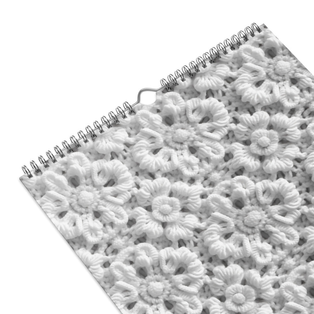 A handmade 2024 CROCHET PATTERNS WALL CALENDAR using black and white crochet patterns for crochet enthusiasts.