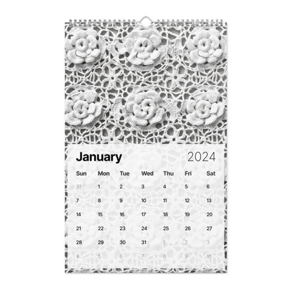 A black and white 2024 CROCHET PATTERNS WALL CALENDAR with flowers on it is perfect for crochet enthusiasts featuring crochet patterns.