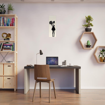 Home office workspace with a desk, chair, laptop, and decorative shelving.