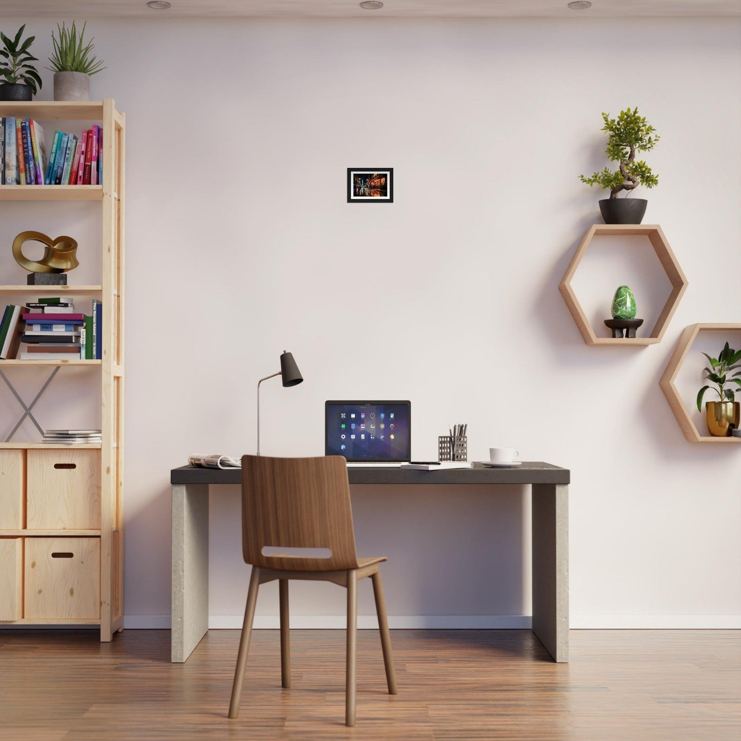 Desk with a laptop and desk lamp, accompanied by a wooden chair.