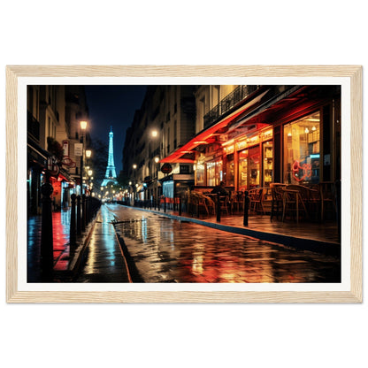 Framed photograph of a rainy Parisian street at night with the illuminated Eiffel Tower visible in the distance.