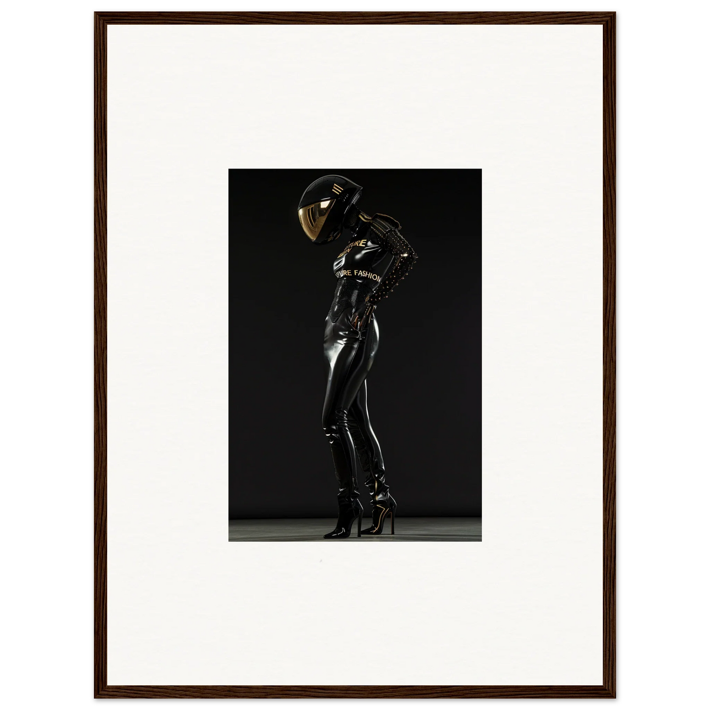 Framed photograph of a person in a shiny black bodysuit and helmet posing dramatically.