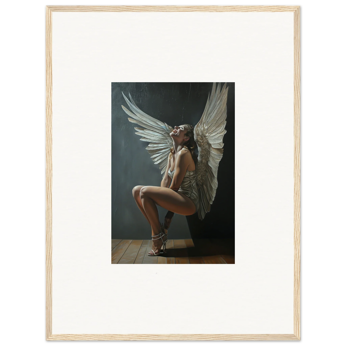 Framed photo of a figure with large white wings in a crouched pose from Heavenly Weakened Psalms