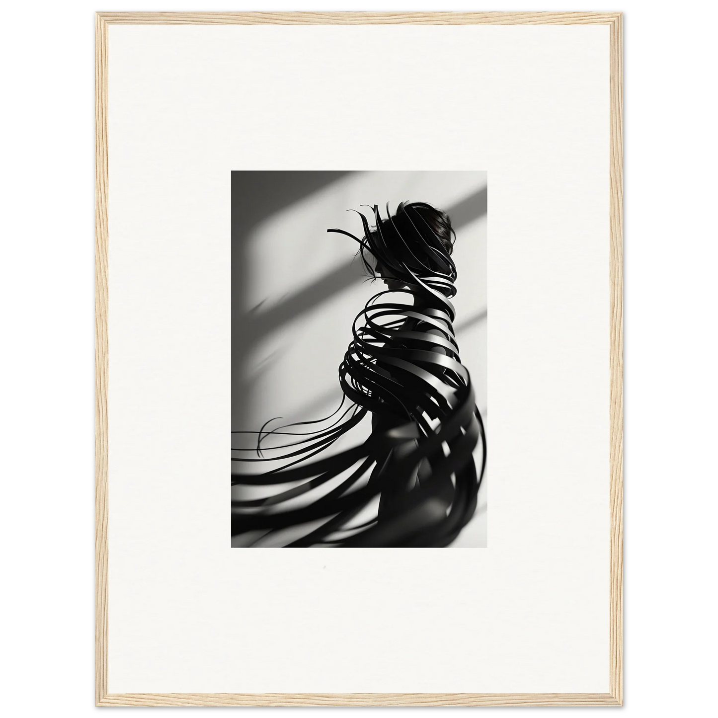 Black and white canvas print of whisper twists with dramatic shadows and flowing hair