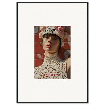 Framed photograph of a person wearing a white crocheted hat and top.