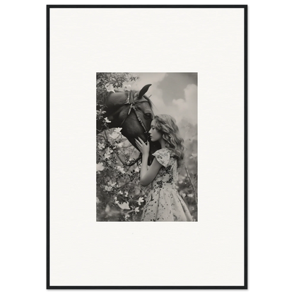 Young girl kissing a donkey in a black and white canvas print for room decoration