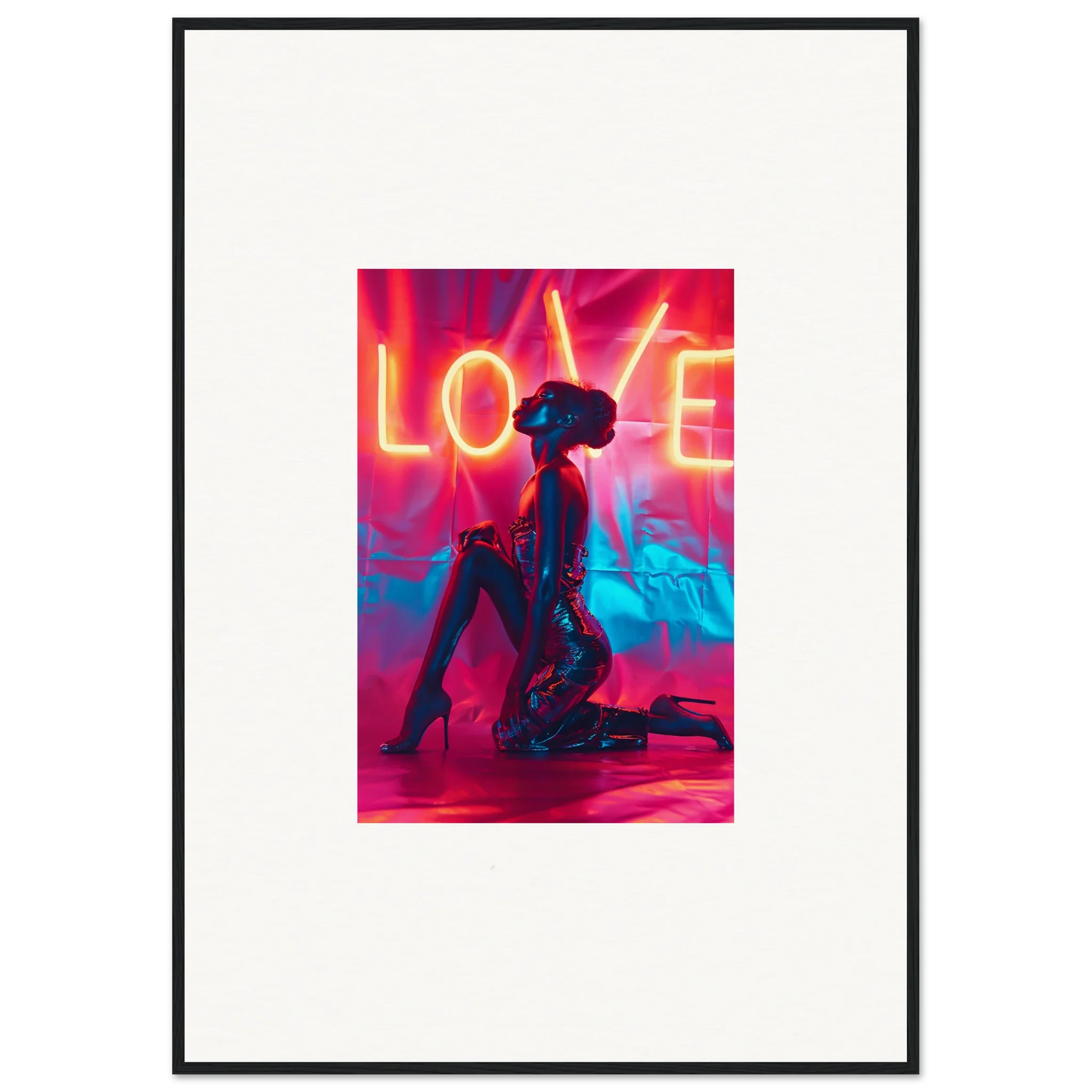 Silhouetted figure kneeling under vibrant LOVE neon sign, perfect for room decoration wall art