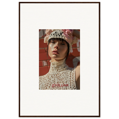 Framed portrait photograph of a person wearing a white crocheted hat and top.