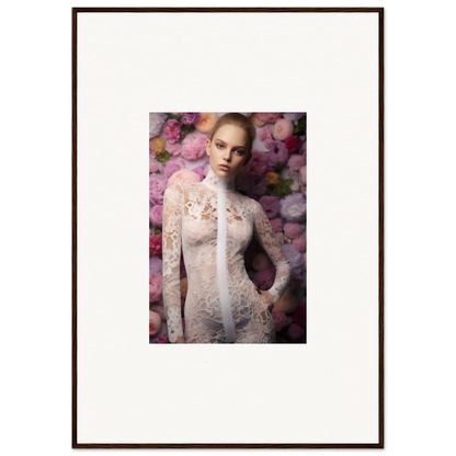 Framed portrait photograph of a woman wearing a sheer lace garment against a floral backdrop.