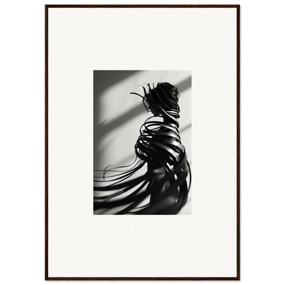 Artistic black and white canvas print of a person’s back with flowing hair and shadows