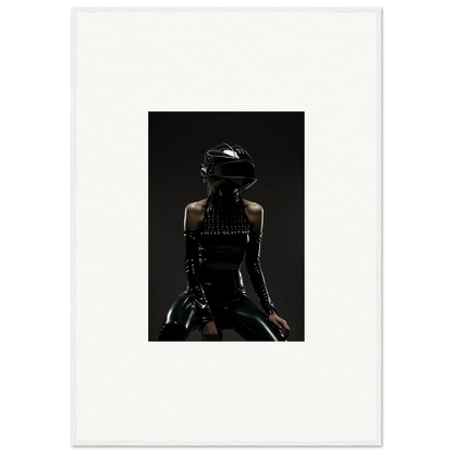 Silhouette of a person wearing a motorcycle helmet and leather outfit.