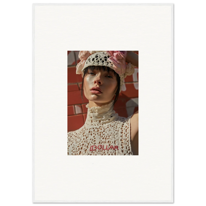 Portrait photograph of a person wearing a white crocheted hat and top against a reddish background.