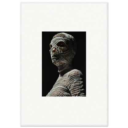 Sculpture of a human head and upper torso covered in a mosaic or tile-like pattern.