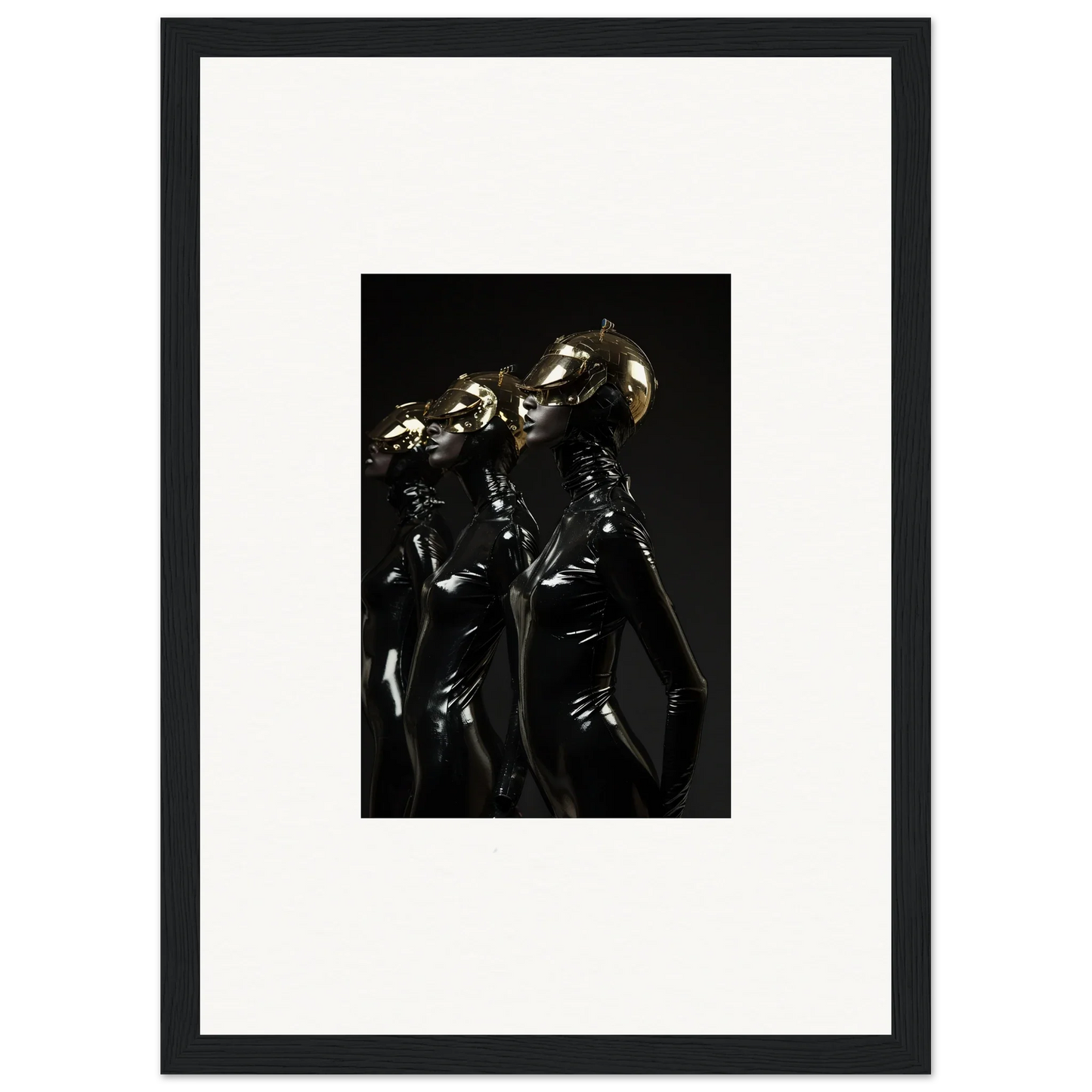 Framed photograph of two figures in shiny black outfits with metallic helmets.