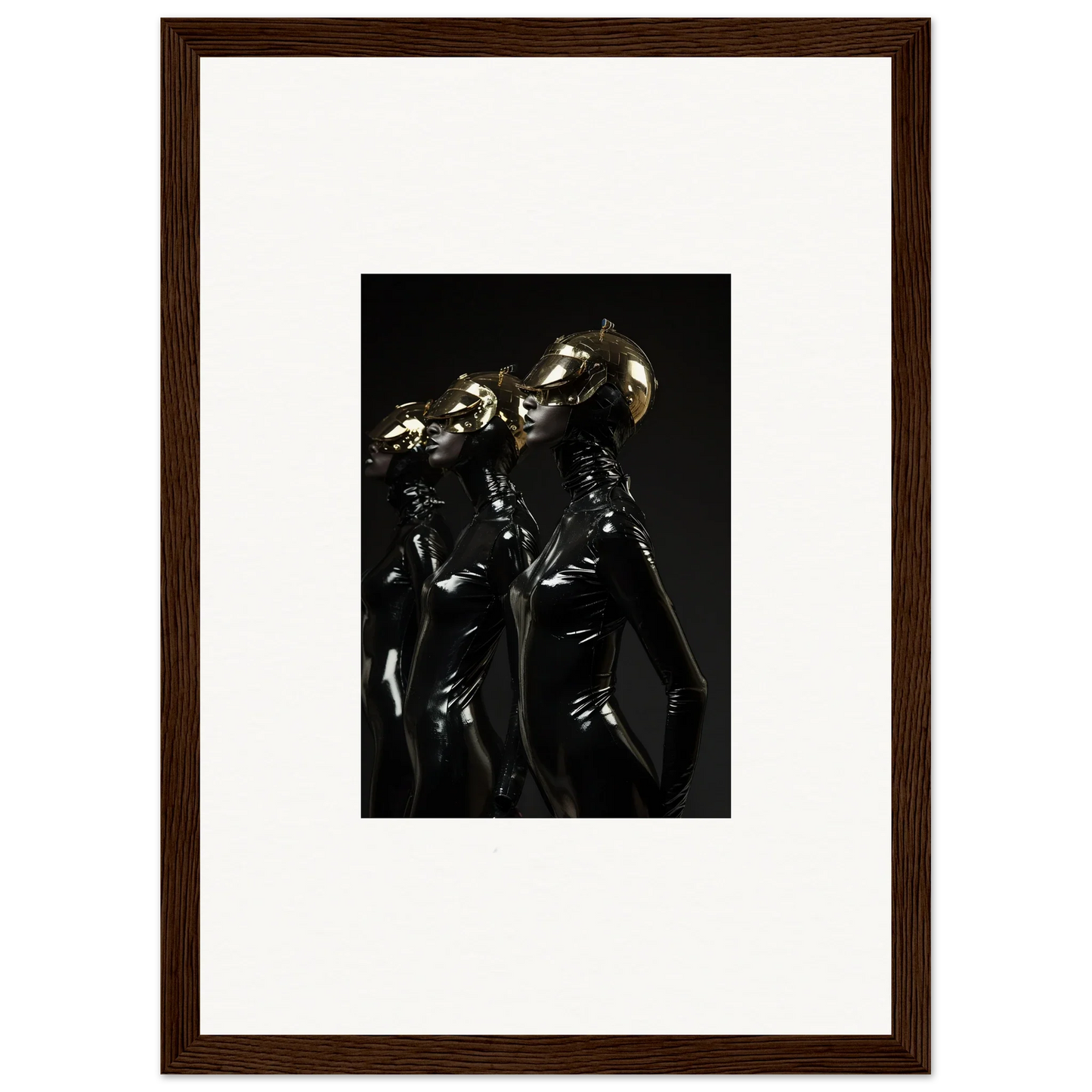 Framed photograph of shiny metallic humanoid figures in dark, dramatic lighting.