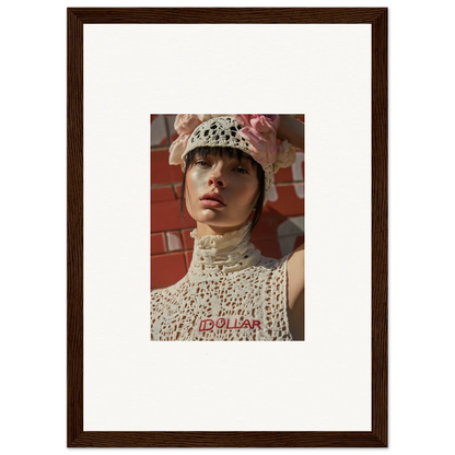 Framed portrait photograph of a person wearing a white crocheted hat and high-necked top.