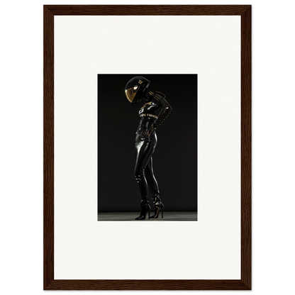 Sleek black latex or rubber bodysuit with a reflective helmet, posed dramatically.