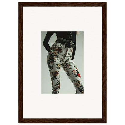 Framed photograph of a person wearing paint-splattered pants.