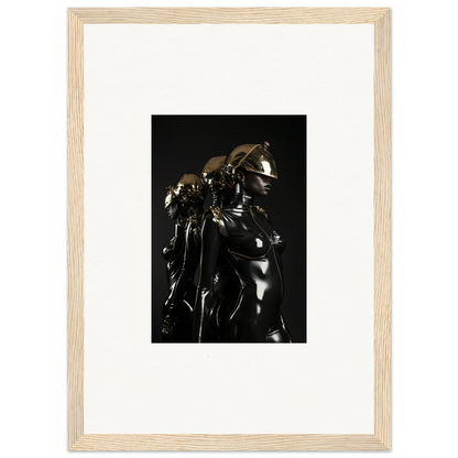 Framed black and white photograph of a metallic-looking sculpture or figure.