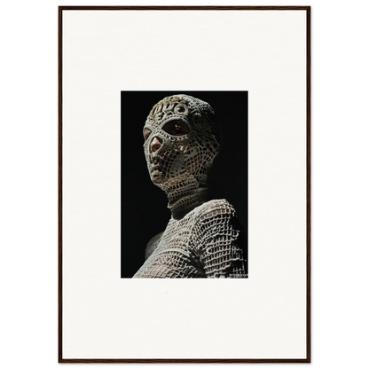 Ancient stone sculpture of a humanoid figure with textured, patterned skin.