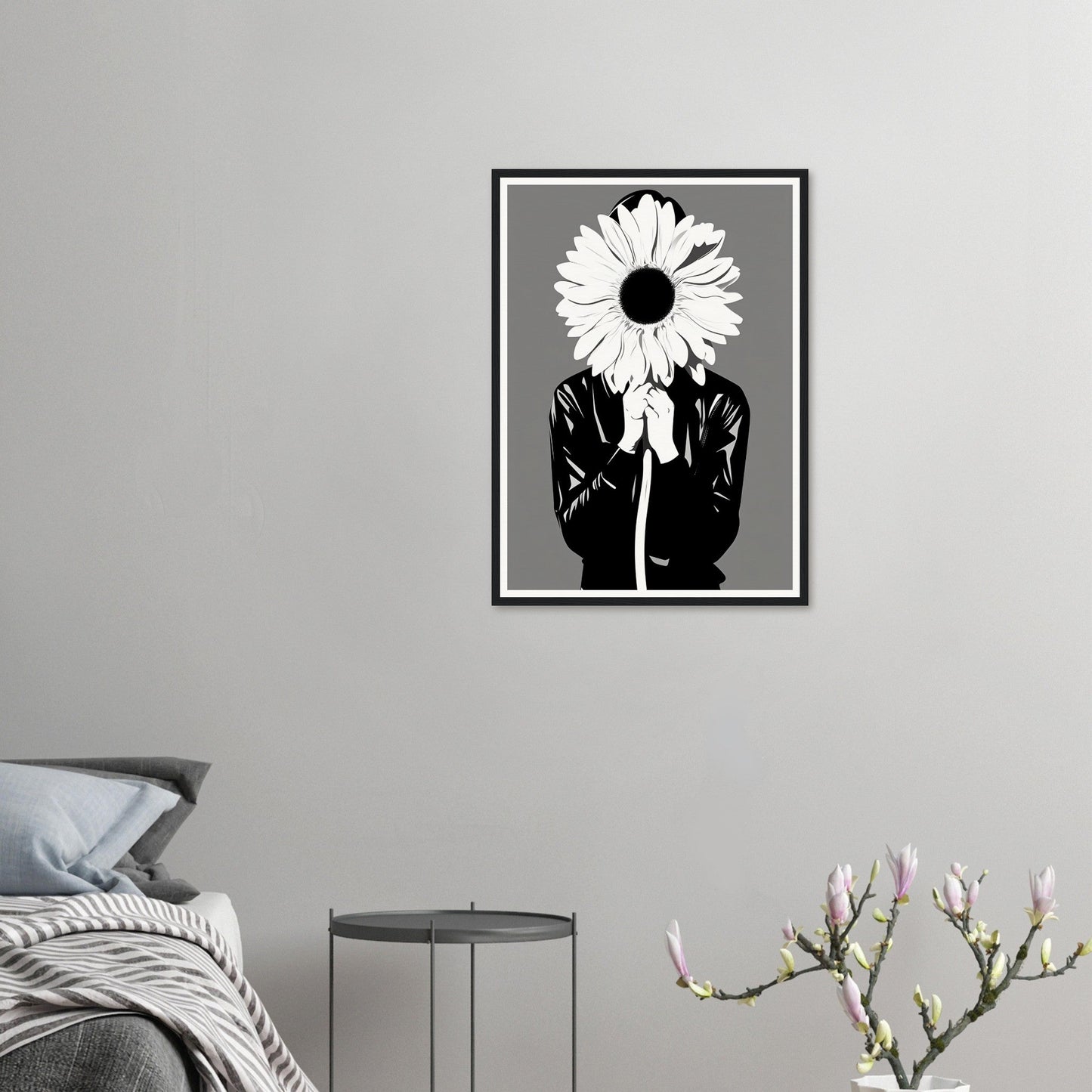 A black and white photo of a man holding a flower