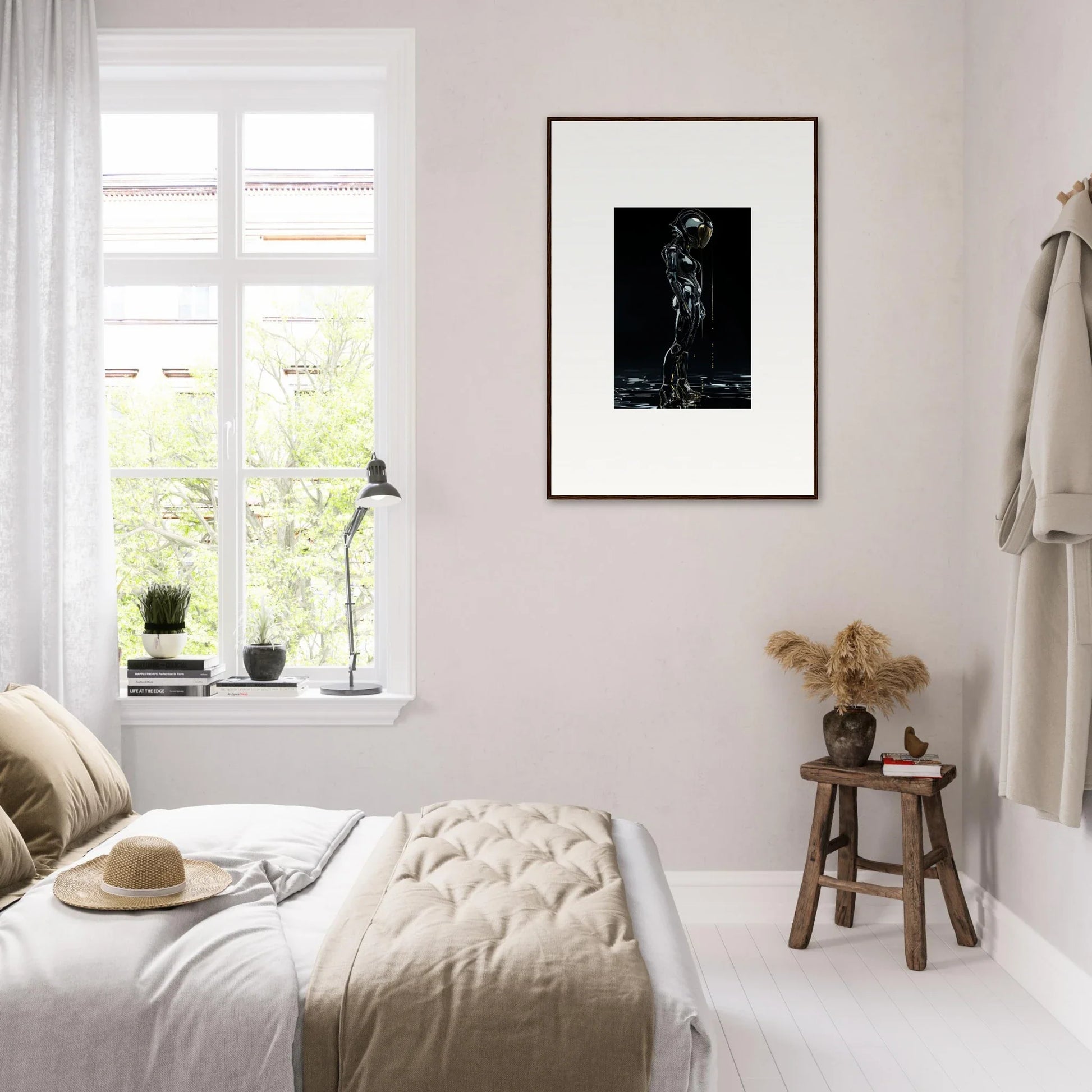 Bright minimalist bedroom featuring framed wall art for stylish room decor