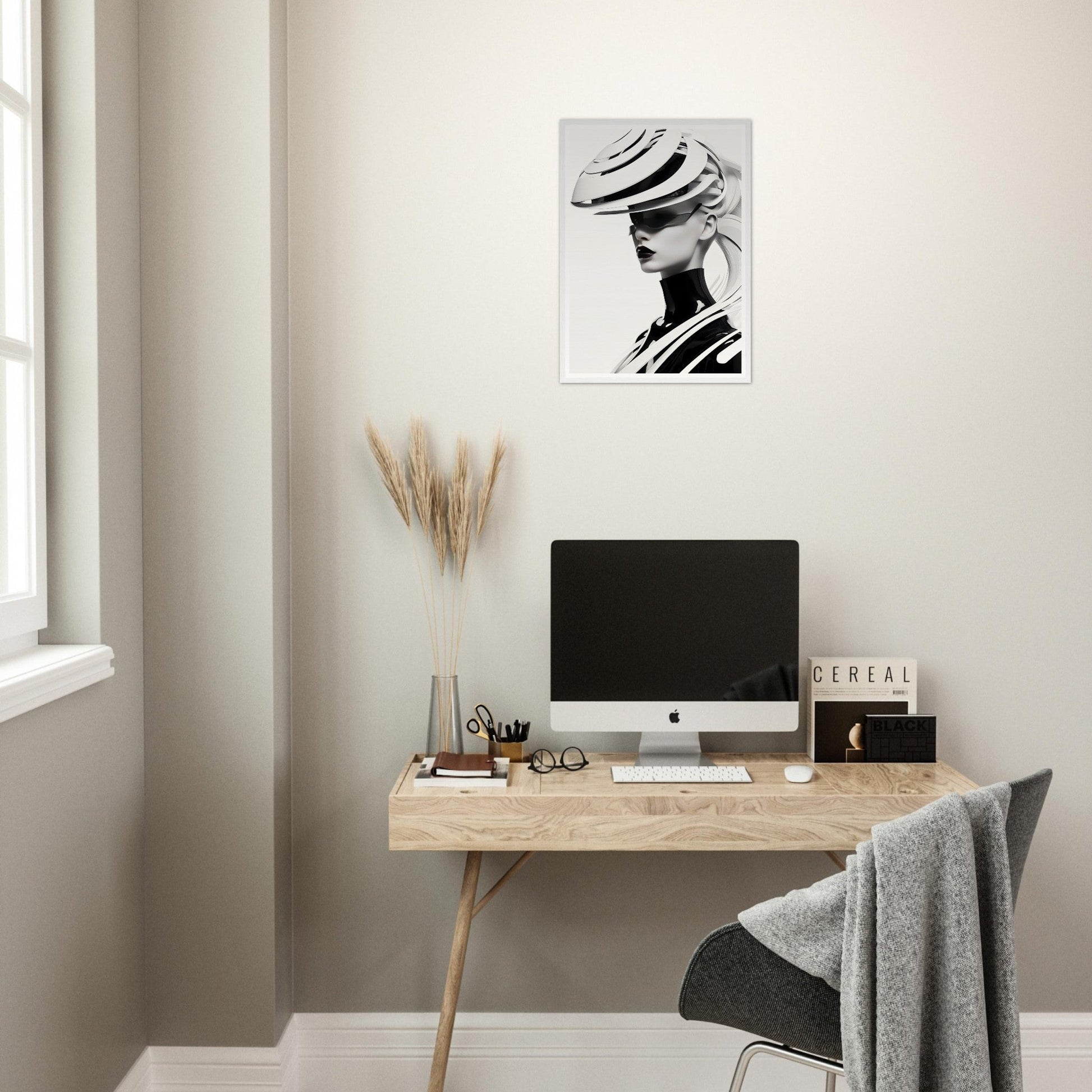 Minimalist wooden desk with a computer monitor and office accessories.