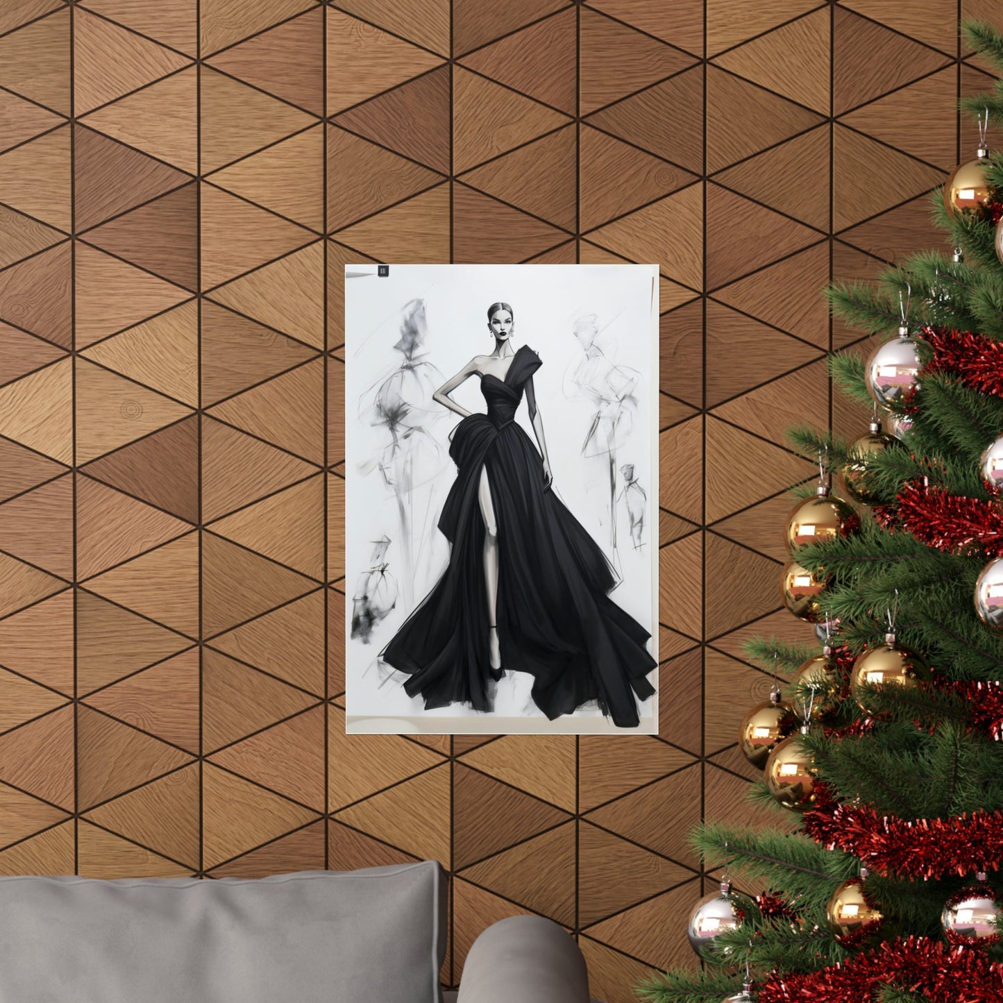 A christmas tree with a black dress hanging on it