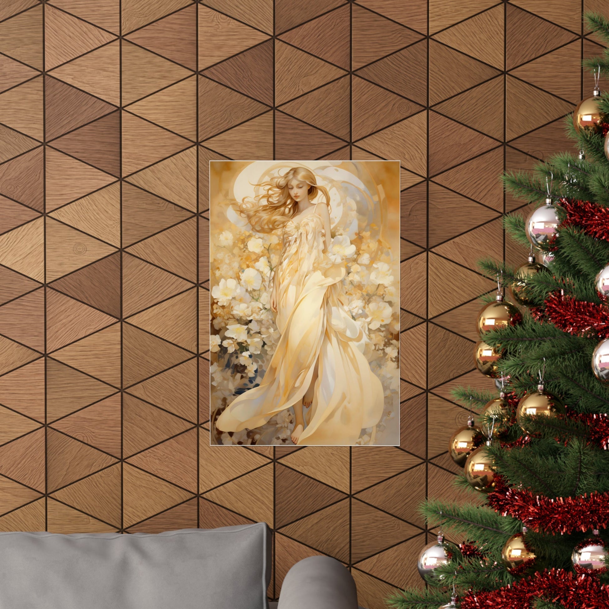 A christmas tree with a gold and white angel painting