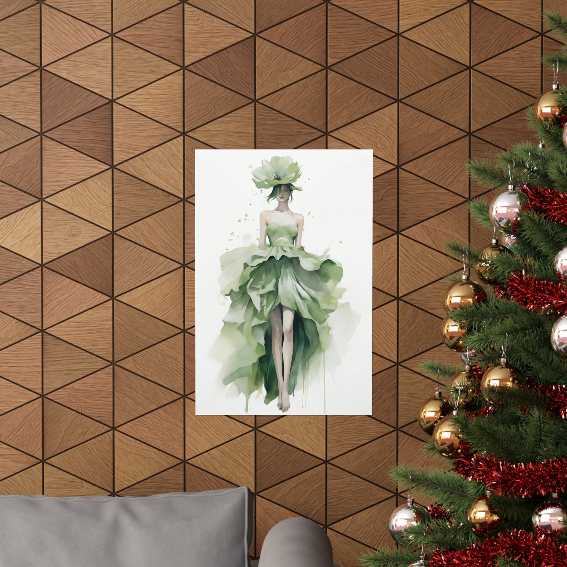 A christmas tree with a picture of a woman in a green dress