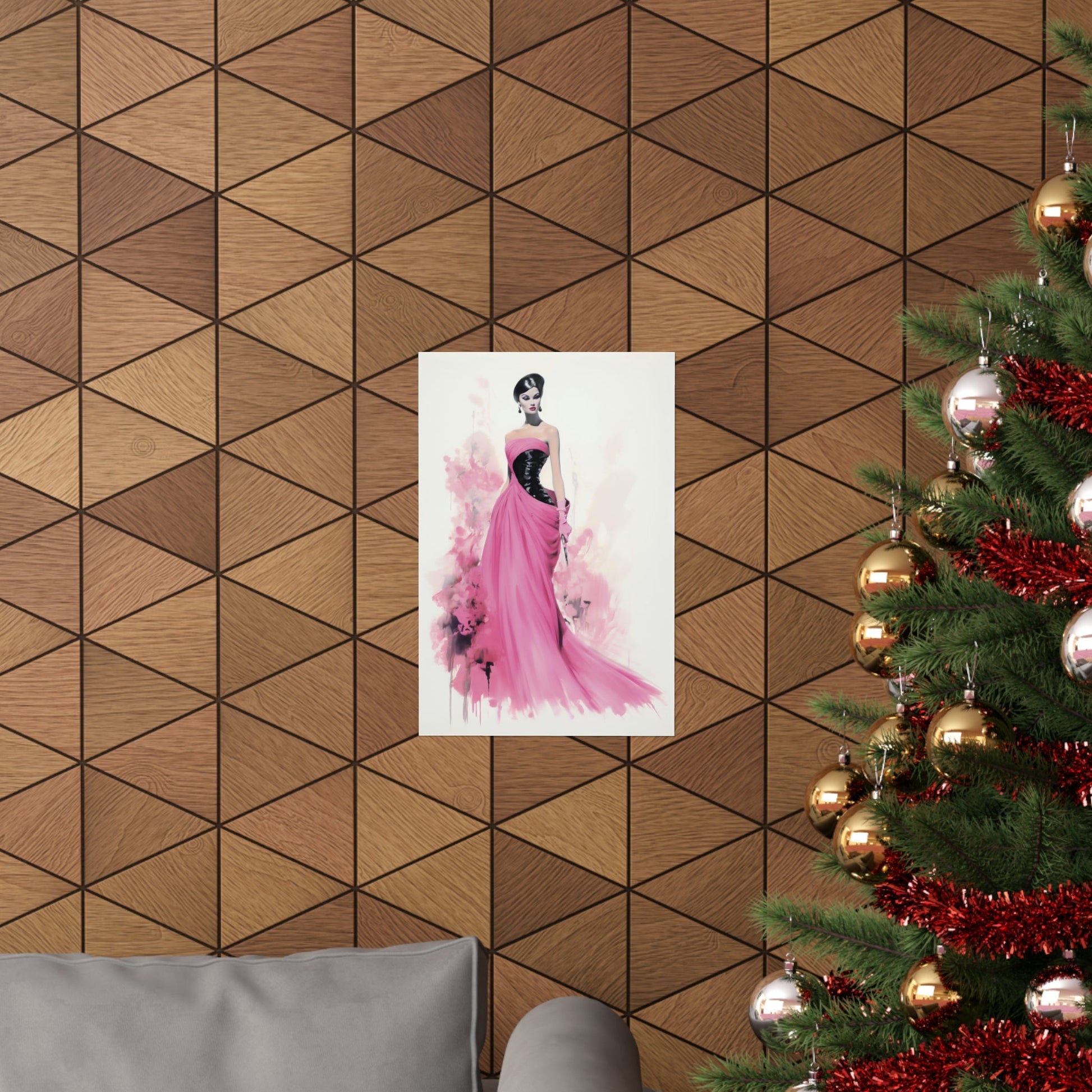 A christmas tree with a pink dress on it