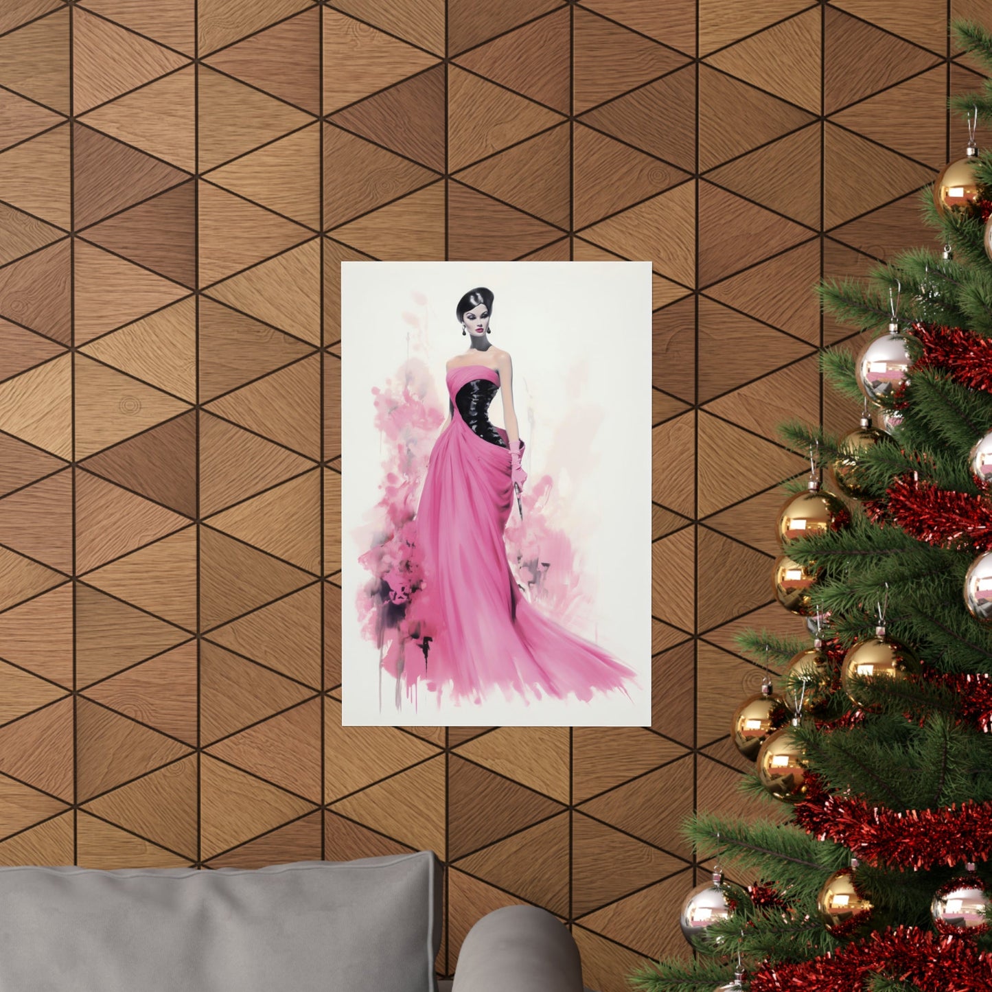 A christmas tree with a pink dress on it