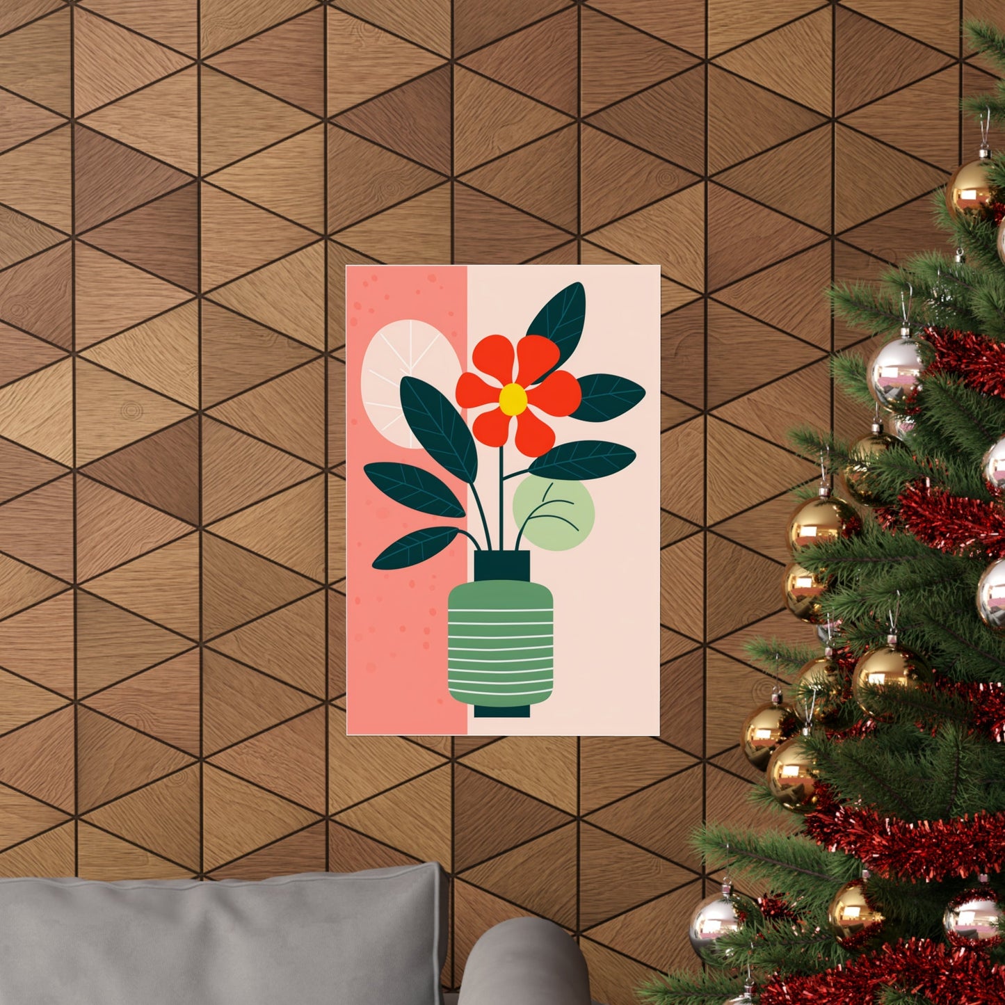 A christmas tree with a red flower in a green vase