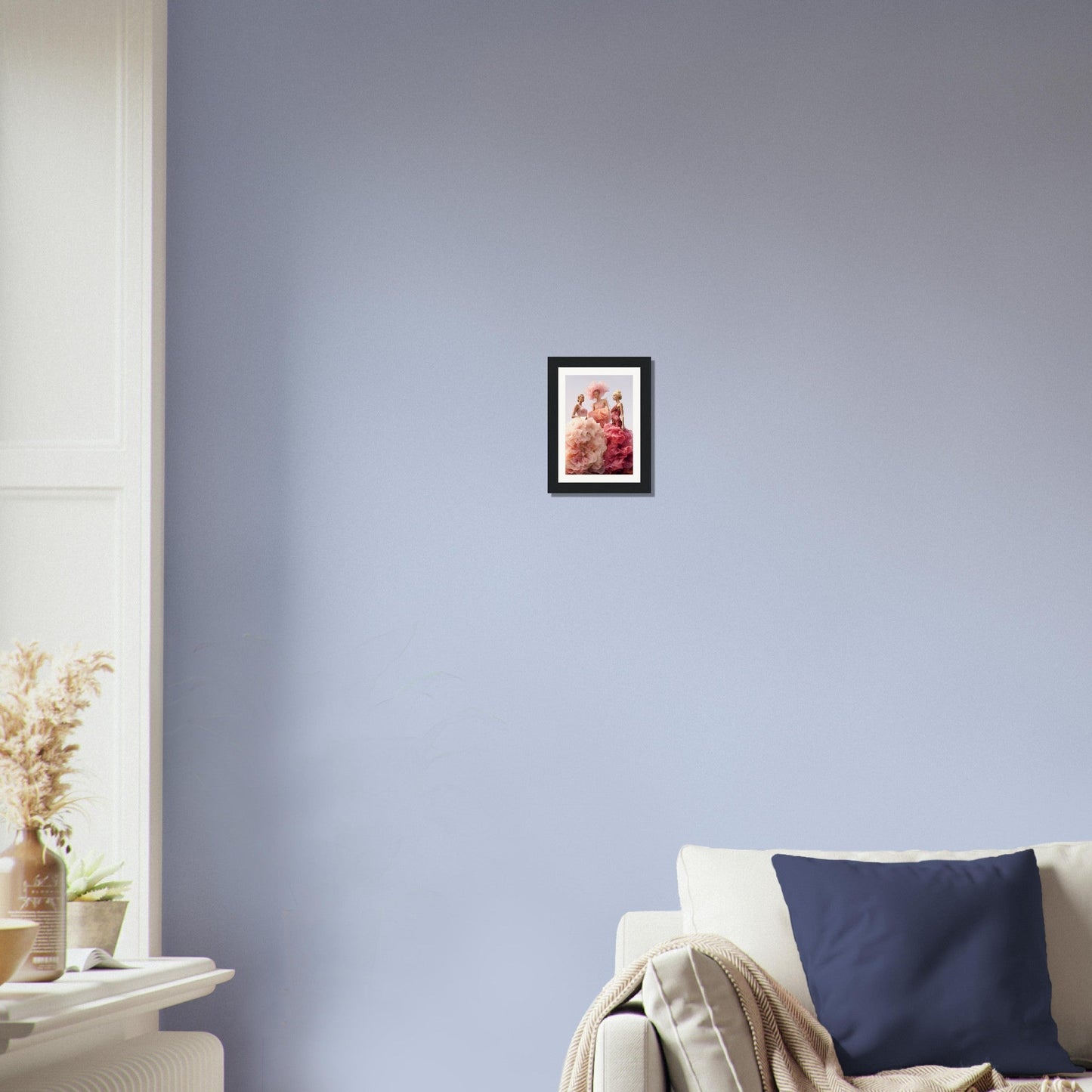 Framed photograph hanging on a pale blue wall.