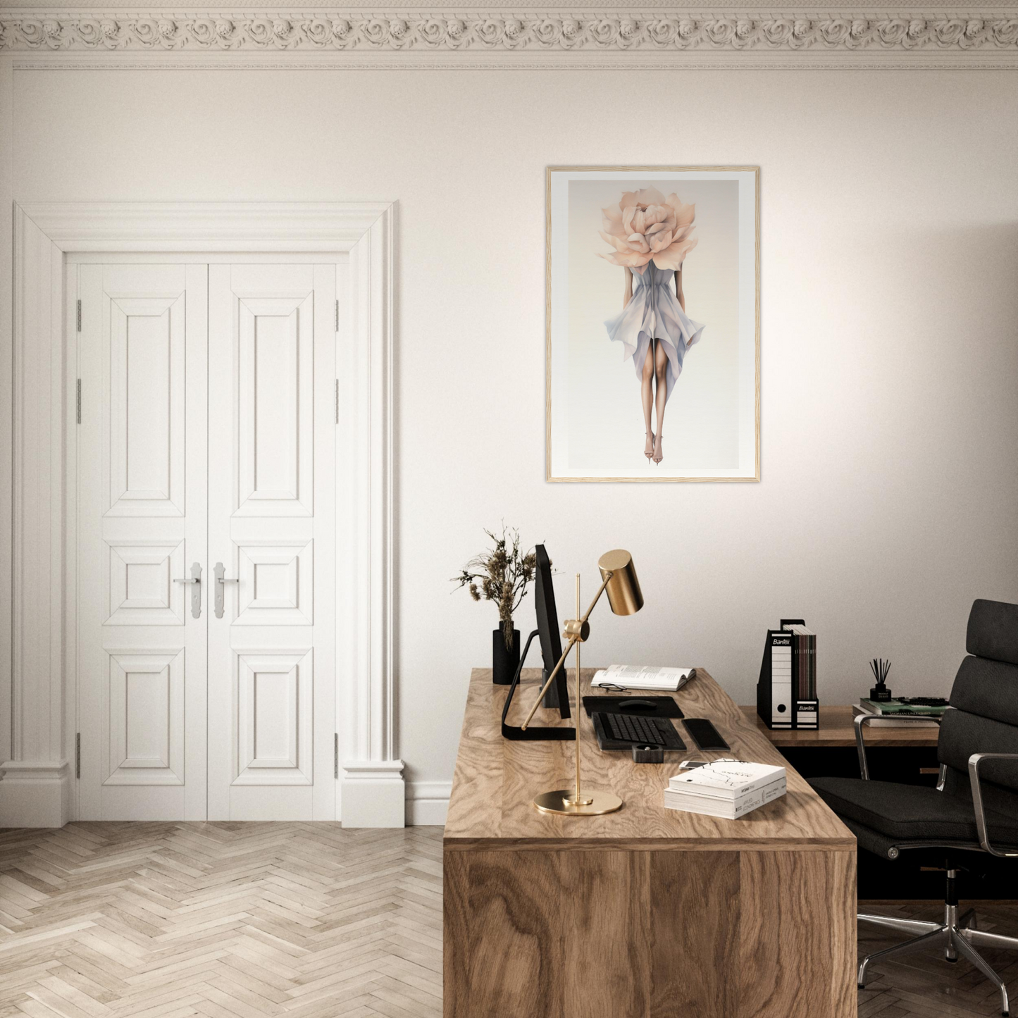 A desk with a chair and a painting on the wall