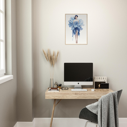 A desk with a computer and a plant