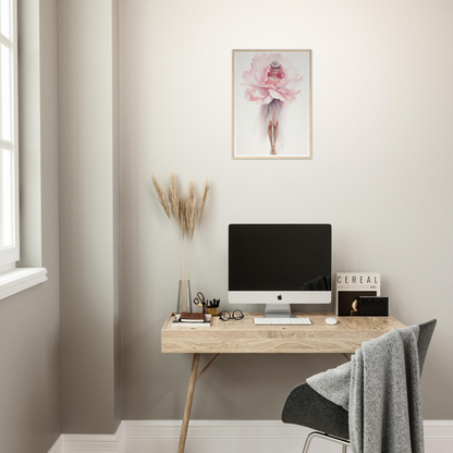 A desk with a computer and a plant on it