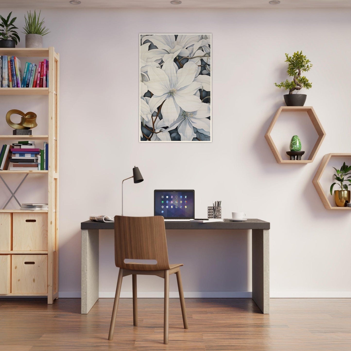 A desk with a laptop and a plant on it